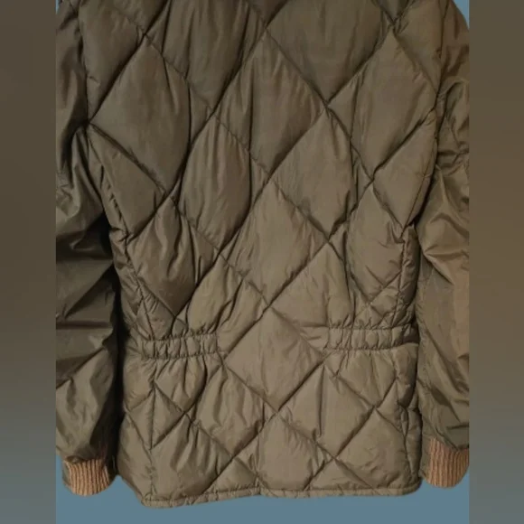 Tempco Goose Down Insulated Puffer Jacket with a faux fur collar.